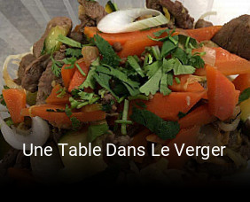 Une Table Dans Le Verger plan d'ouverture