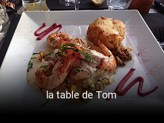 la table de Tom ouvert